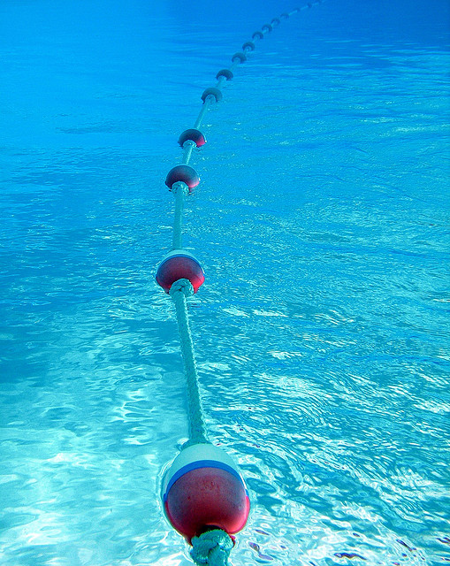 Photo of floating barrier taken under pool water by Steve Jurvetson